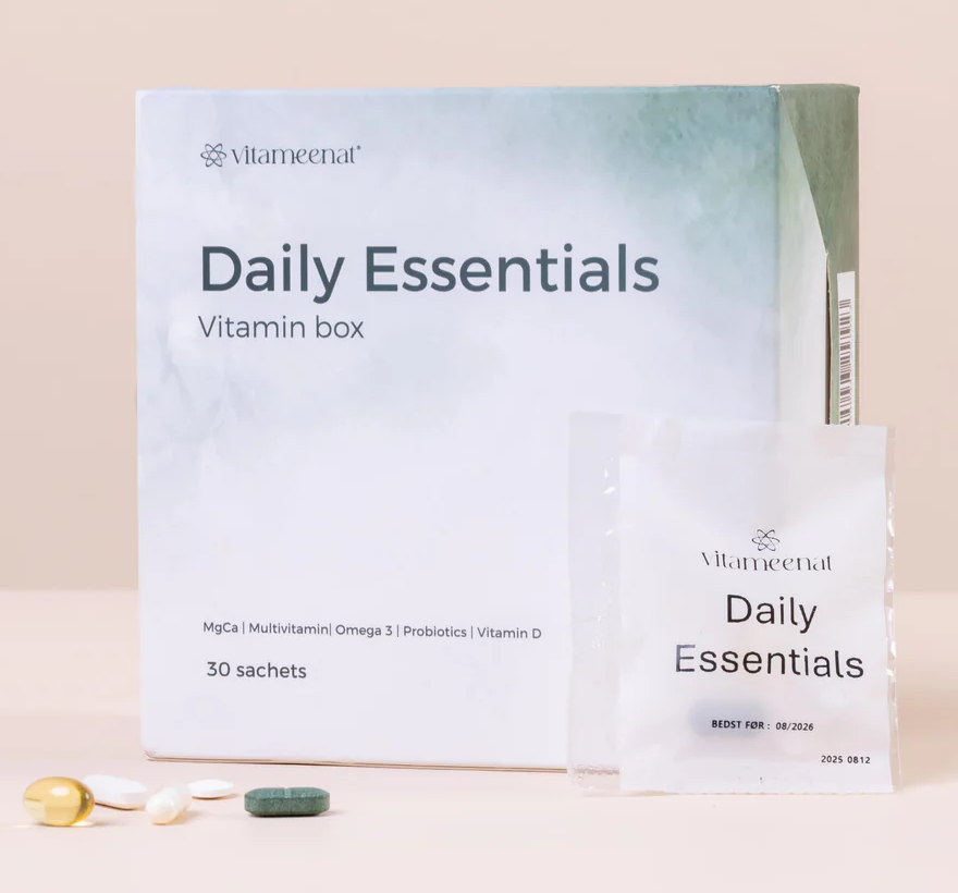 Vitameenat Daily Essentials vitamin box on a beige background