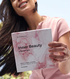 Woman holding a 'Inner Beauty Vitamin box' by vitameenat